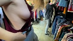 Girls tits hang out showing nip slip while shopping in public